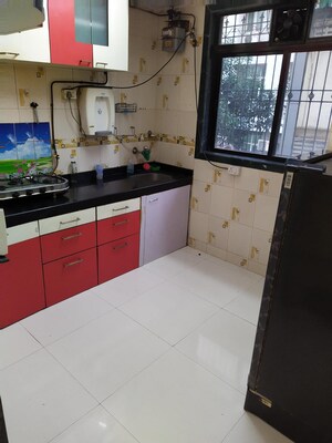 Kitchen in 2 BHK Apartment at Shree Ravechi Apartments, Kopar Khairane – for Rent