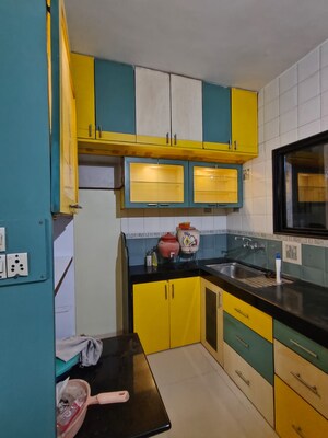 Kitchen in 2 BHK Apartment at Oakwood CHS Sus, Sus – for Rent