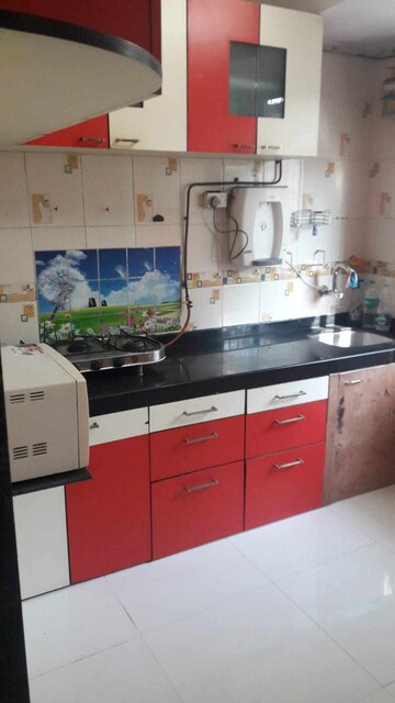 Kitchen in 2 BHK Apartment at Shree Ravechi Apartments, Kopar Khairane – for Rent