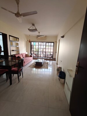 Living Room in 2 BHK Apartment at Eken Heights, Khar West – for Rent