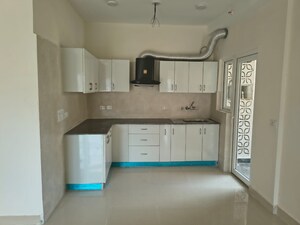 Kitchen in 3 BHK Apartment at Paramount Floraville, Sector 137 – for Sale