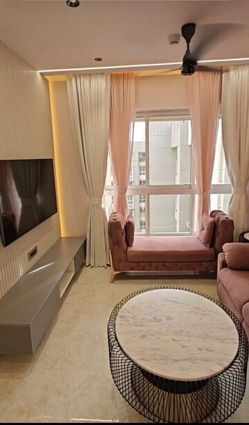 Living Room in 2 BHK Apartment at Lodha Amara, Kolshet Road – for Rent