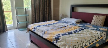 Bedroom in 2 BHK Apartment at Pushpanjali Orchid Park, Rajpur – for Rent