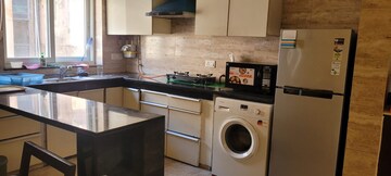 Kitchen in 2 BHK Apartment at Pushpanjali Orchid Park, Rajpur – for Rent