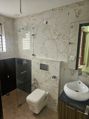 Bathroom in 4 BHK Builder Floor at Puri Aman Vilas, Sector 89 – for Sale