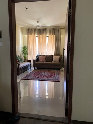 Living Room in 2 BHK Apartment at Universal The Oasis, Cbd Belapur Sector 30 – for Sale