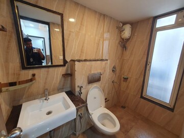 Bathroom in 1 BHK Apartment at Lodha Amara, Kolshet Road – for Rent