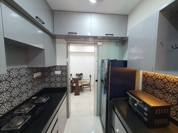 Kitchen in 1 BHK Apartment at Lodha Amara, Kolshet Road – for Rent