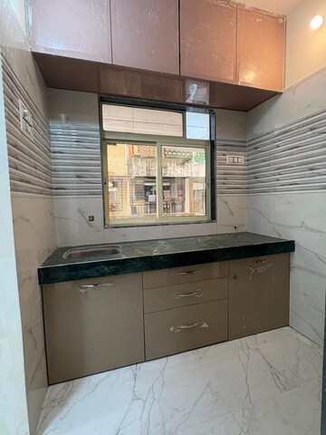 Kitchen in 1 BHK Apartment at MJV Vaishnavi Arcade, Virar East – for Sale