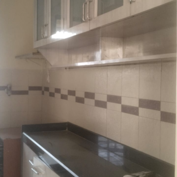 Kitchen in 3 BHK Apartment at Yashvasin CHS Ltd, Ranjanpada – for Sale