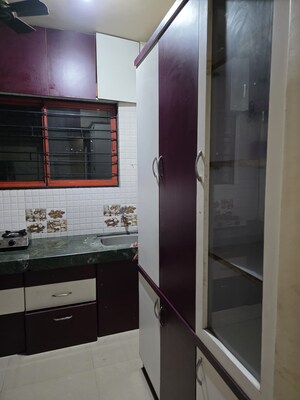 Kitchen in 2 BHK Apartment at Woodland Avenue, Kothrud – for Rent