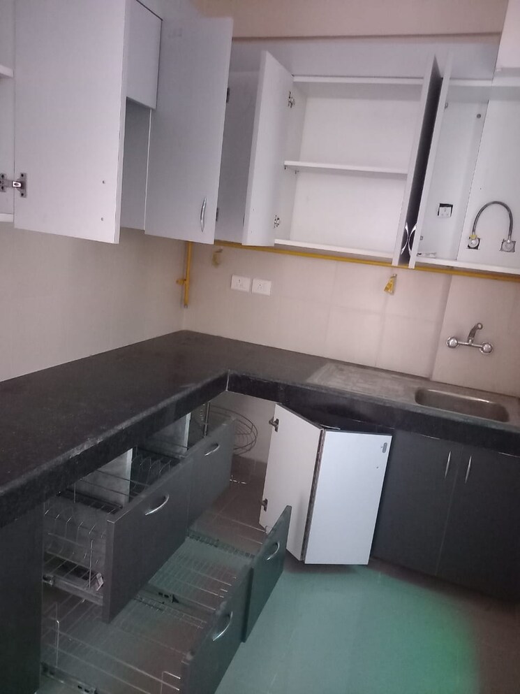 Kitchen, wave-executive-floors 2 Bedroom 900 Sq.Ft. Apartment In Wave City Ghaziabad 9509674