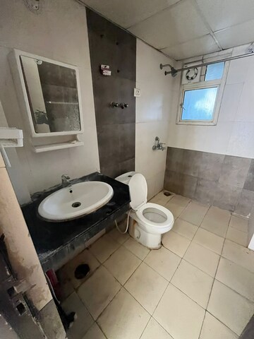 Bathroom in 3 BHK Apartment at Supertech Cape Town, Sector 74 – for Rent