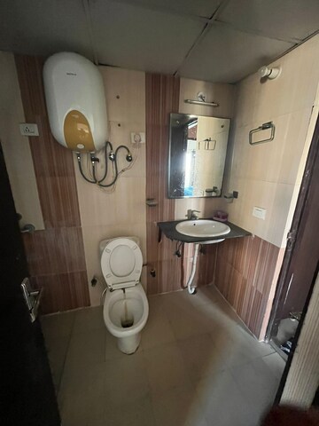 Bathroom in 2 BHK Apartment at Prateek Wisteria, Sector 77 – for Rent