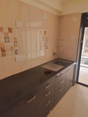 Kitchen in 3 BHK Apartment at Shree Krishna Navageeta, Chembur – for Sale