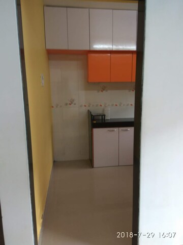 Kitchen in 2 BHK Apartment at Mangal Krupa, Malad East – for Sale