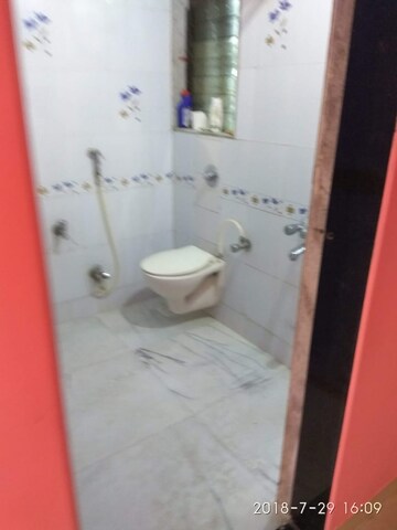 Bathroom in 2 BHK Apartment at Mangal Krupa, Malad East – for Sale