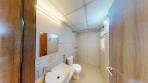 Bathroom in 2 BHK Apartment at Bhartiya Nikoo Homes, Thanisandra Main Road – for Sale