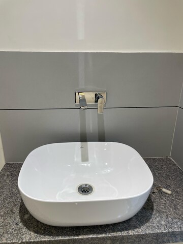 Bathroom in 3 BHK Apartment at Prahlad Nagar – for Sale