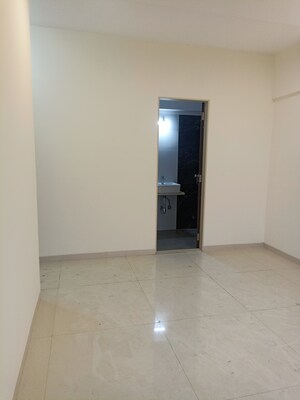 Room in 2 BHK Apartment at IM Applaud 38, Goregaon East – for Rent