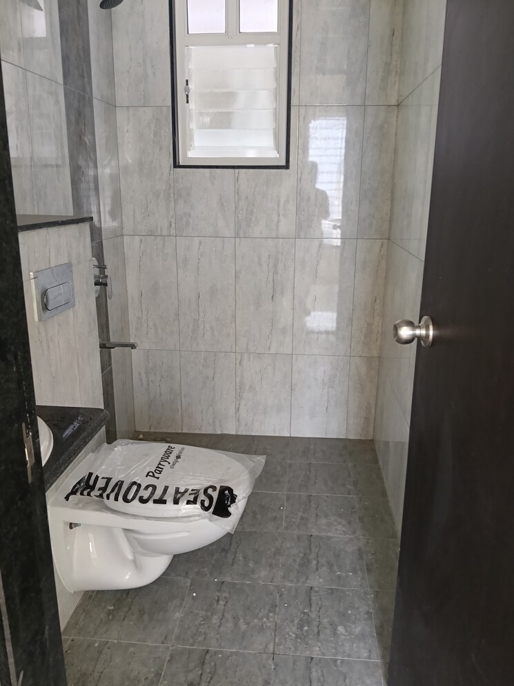 Bathroom, kolte-patil-life-republic-r-10 2 Bedroom 700 Sq.Ft. Apartment In Hinjewadi Pune 9510011
