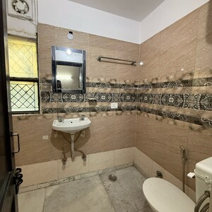 Bathroom in 2 BHK Builder Floor at Kalkaji – for Rent