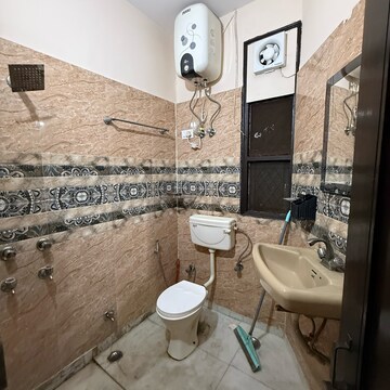 Bathroom in 2 BHK Builder Floor at Kalkaji – for Rent