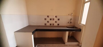 Kitchen in 2 BHK Apartment at SCC Blossom, Raj Nagar Extension – for Sale