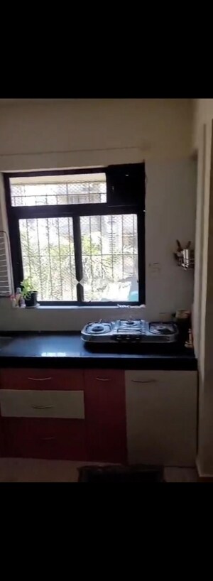 Kitchen in 2 BHK Apartment at Raunak Unnathi Greens, Kasarvadavali – for Rent