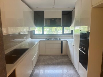 Kitchen in 4 BHK Builder Floor at Golf Course Road – for Sale