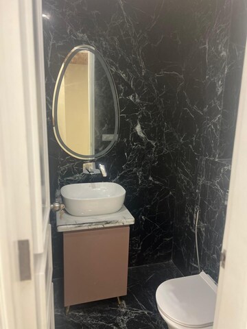 Bathroom in 4 BHK Builder Floor at Golf Course Road – for Sale