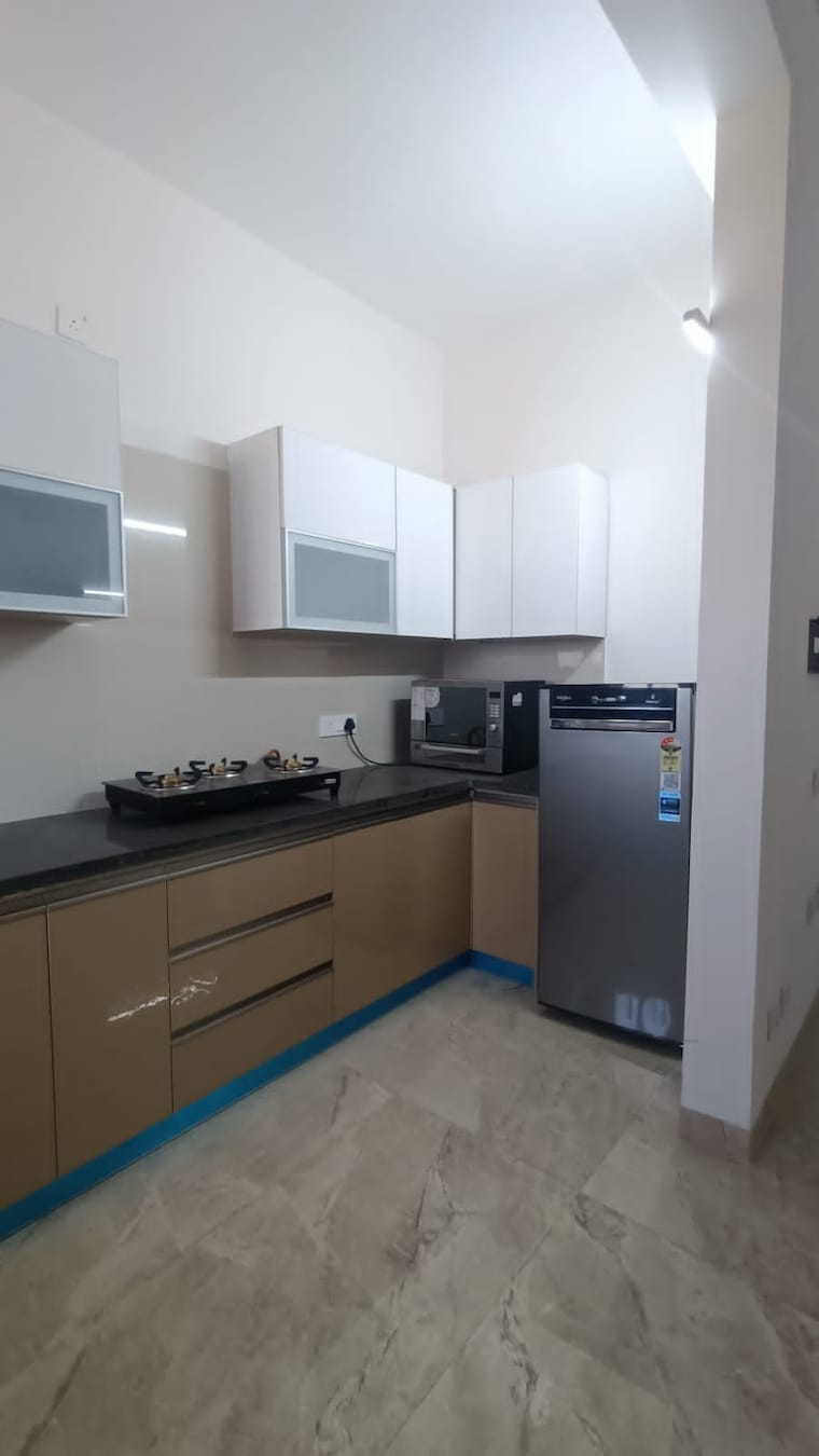 Kitchen, artique-uptown-skylla 2 Bedroom 1220 Sq.Ft. Apartment In International Airport Road Zirakpur 9511023