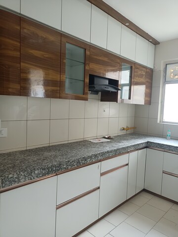 Kitchen in 4 BHK Apartment at 3C Lotus Panache, Sector 110 – for Sale