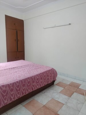 Bedroom in 2.5 BHK Apartment at RWA Jalvayu Vihar, Sector 25 – for Rent
