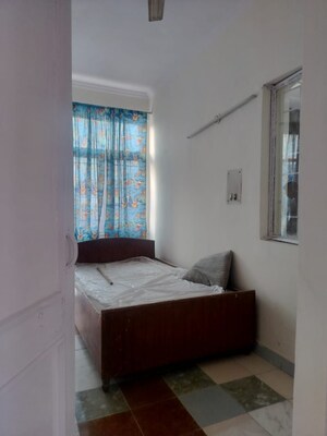 Living Room in 2.5 BHK Apartment at RWA Jalvayu Vihar, Sector 25 – for Rent