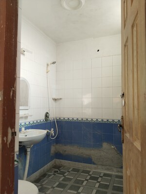 Bathroom in 2 BHK Apartment at Saffron Kanishka Tower, Sector 34 – for Rent