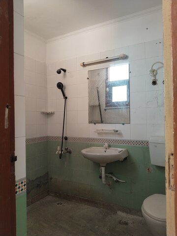 Bathroom in 2 BHK Apartment at Saffron Kanishka Tower, Sector 34 – for Rent