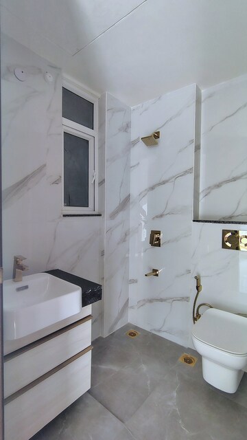 Bathroom in 3 BHK Apartment at Smart World Orchard, Sector 61 – for Rent