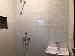 Bathroom in 4 BHK Builder Floor at Defence Colony – for Rent