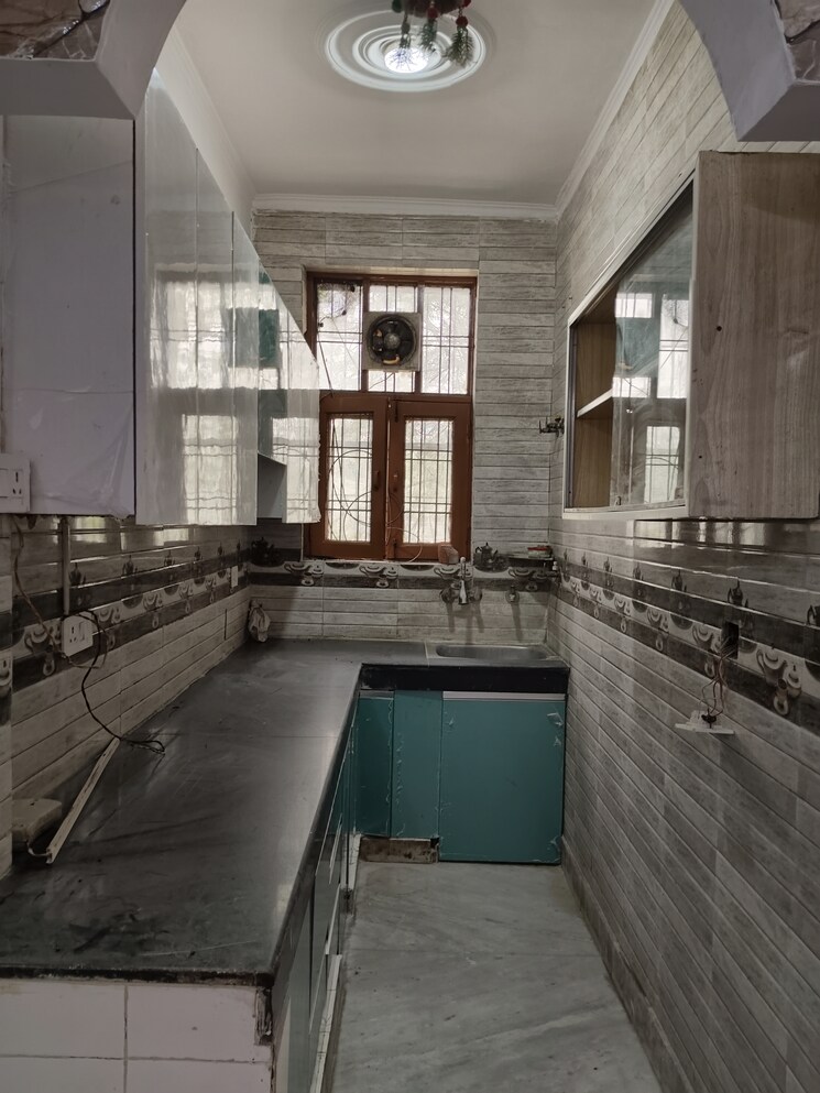 Kitchen, ashoka-enclave-faridabad 2 Bedroom 900 Sq.Ft. Builder Floor In Sector 34 Faridabad 9511938