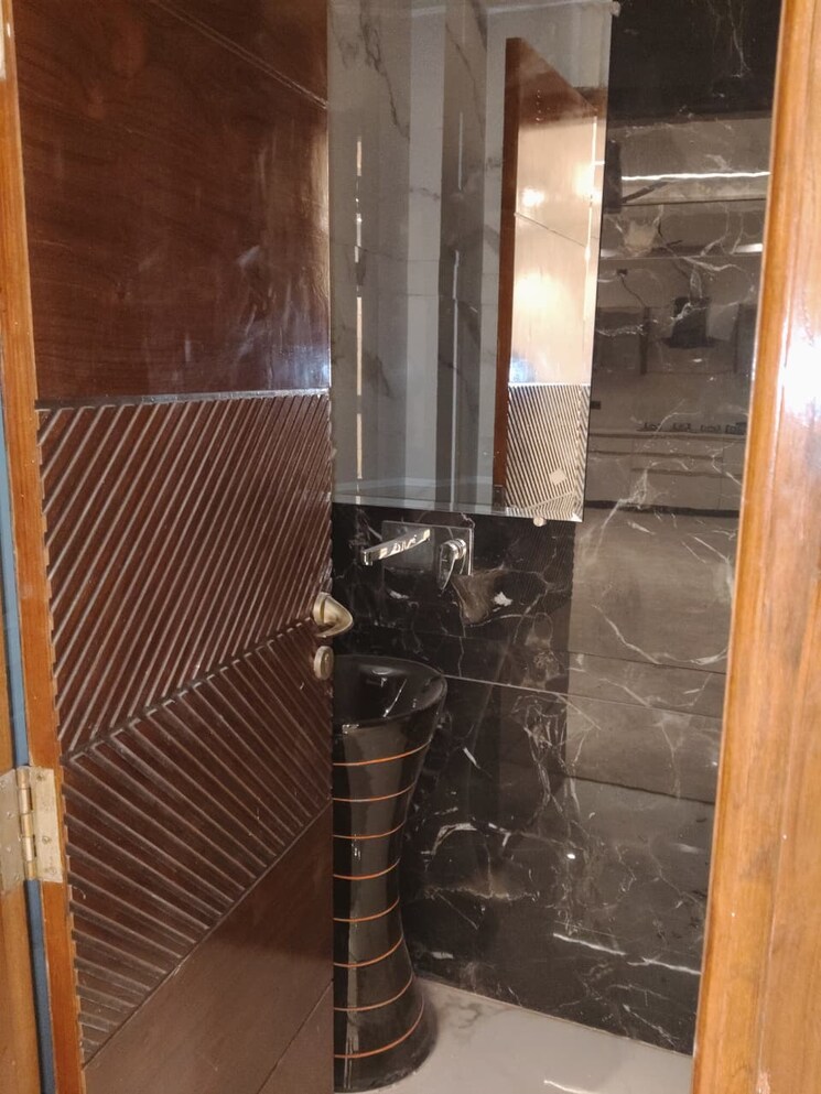 Washroom, ambience-caitriona 4 Bedroom 7000 Sq.Ft. Apartment In Sector 24 Gurgaon 9512006