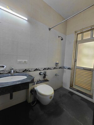 Bathroom in 2 BHK Apartment at Raheja Interface Heights, Malad West – for Rent