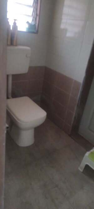 Living Room in 2 BHK Apartment at Charms Residency CHS, Brahmand – for Rent