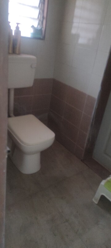 Living Room in 2 BHK Apartment at Charms Residency CHS, Brahmand – for Rent