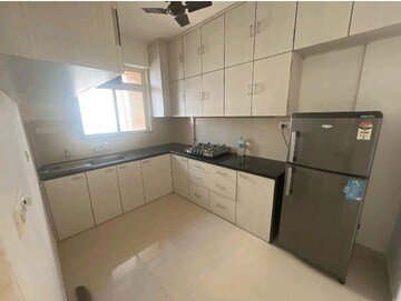 Kitchen in 2 BHK Apartment at Hiranandani Estate Winona, Ghodbunder Road – for Rent