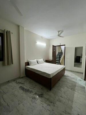 Bedroom in 4 BHK Builder Floor at Dlf Phase I – for Rent