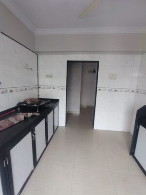 Kitchen in 2 BHK Apartment at Millennium Avanish Phase I, Sector 10a Airoli – for Sale