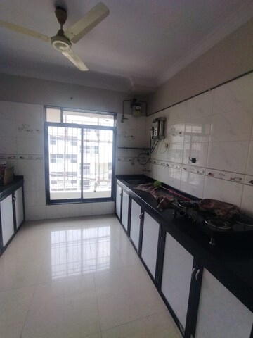 Kitchen in 2 BHK Apartment at Millennium Avanish Phase I, Sector 10a Airoli – for Sale