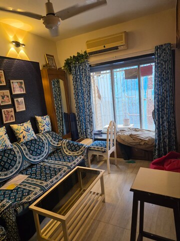 Living Room in 2 BHK Apartment at Vile Parle East – for Rent