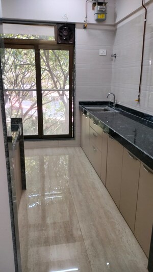 Kitchen in 1 BHK Apartment at Je And Vee Om Trimurti, Malad East – for Rent